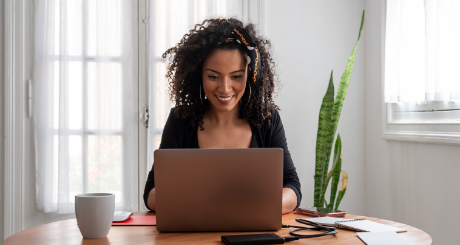 Girl In Kitchen On Computer