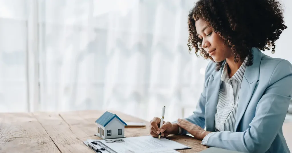 Agent reviewing financial documents